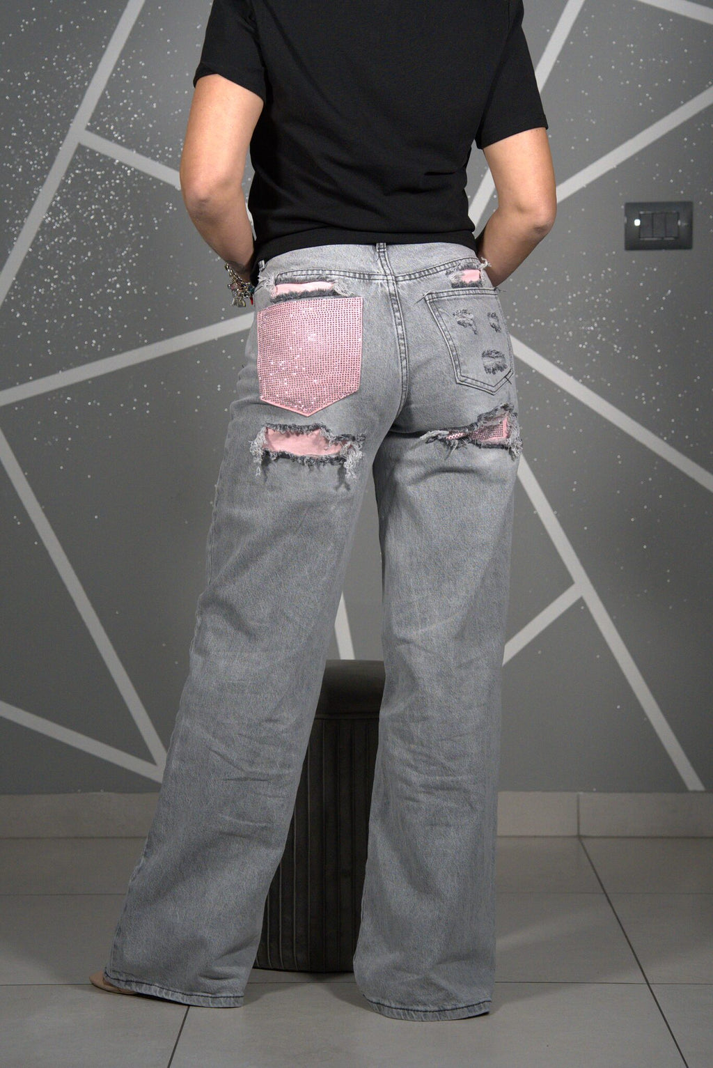 Jeans tasca rosa