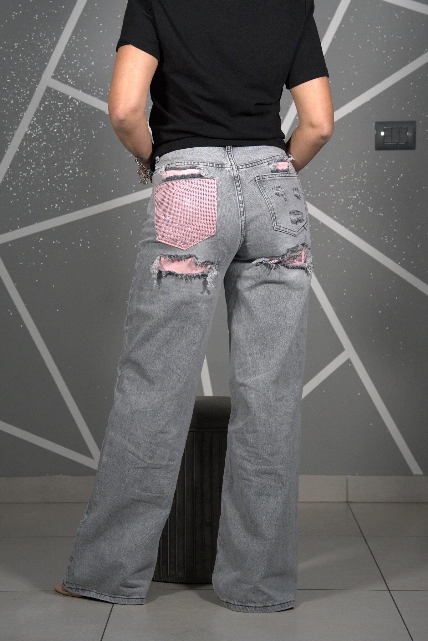 Jeans tasca rosa
